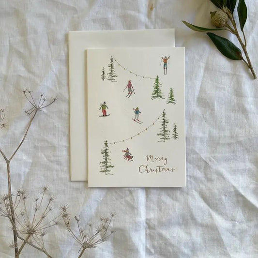 Skiers in the Snow Gold-Foiled Luxury Christmas Card - Winterberries